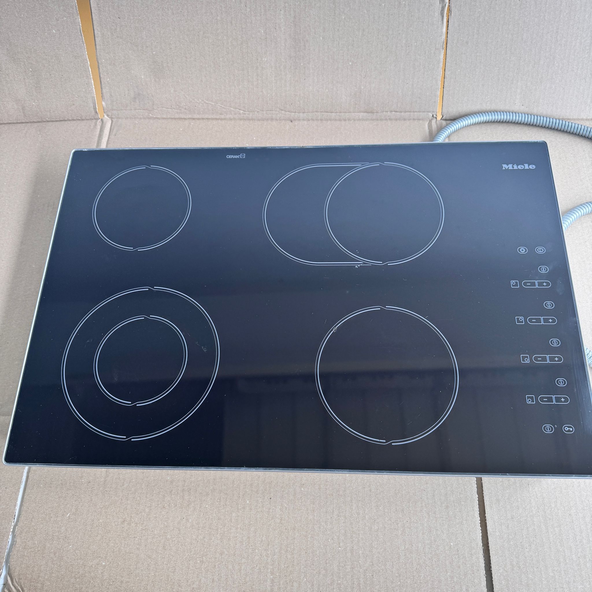 Miele 30 Inch Self-Contained Ceran Glass Electric Cooktop Miele 30 Inch Self-Contained Ceran Glass Electric Cooktop